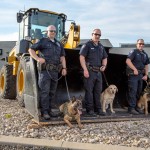 Left to right - Officer Isaiah Wear with K9 Odin, Officer Tyler Marston with K9 Dory and Officer Rick Lee with K9 Randy.