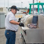 Ryan Rimbey, Field Service Supervisor, and Mark Hennes, Regional Service Manager (not shown), kept burgers and dogs comin' hot and fast!
